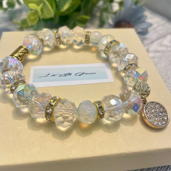 Charmed Clear Crystal 12/14mm with charm, gold  and cz accents - Picture 3 of 5